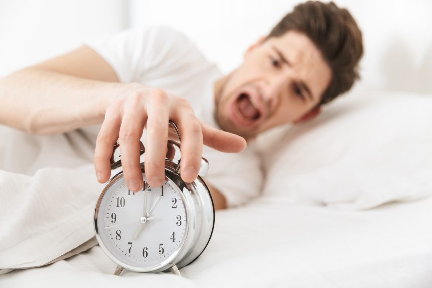 Close up of an annoyed young man – International Institute of Sleep