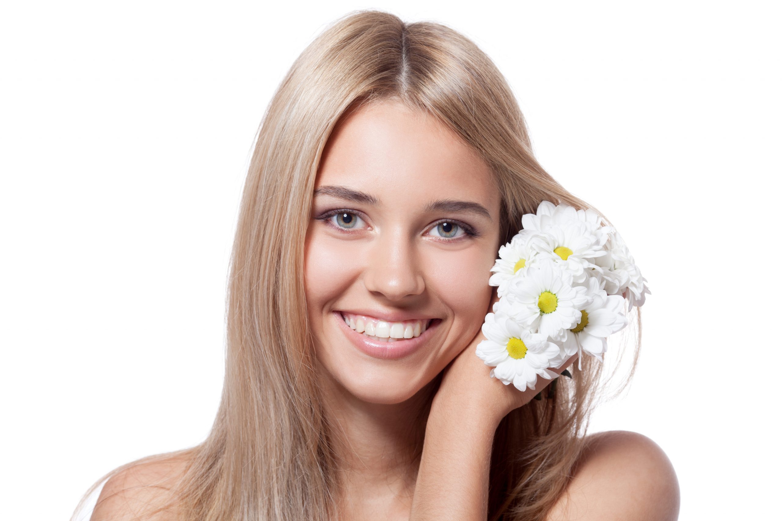 Beautiful happy young woman with flowers